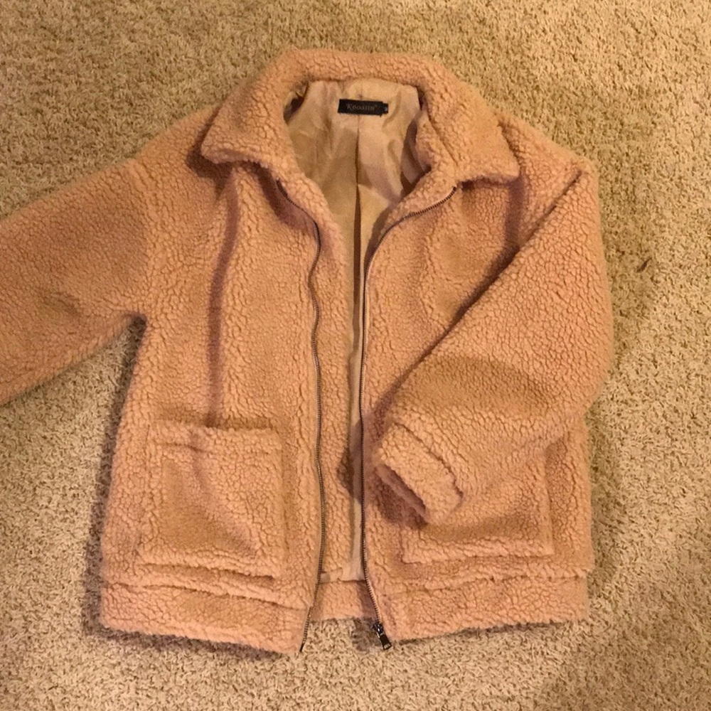 Light brown poopy/fluffy jacket.